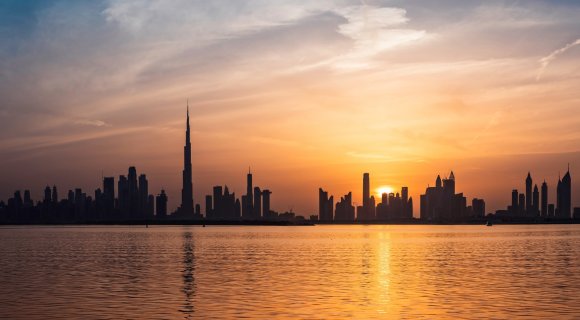 What are the top areas in Dubai with apartments for sale under AED 800k?